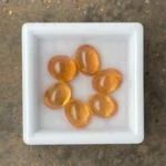 Mandarin Garnet Parcel 11.95 ct | Oval Cabochon | Fanta Orange | Iseyin, Nigeria